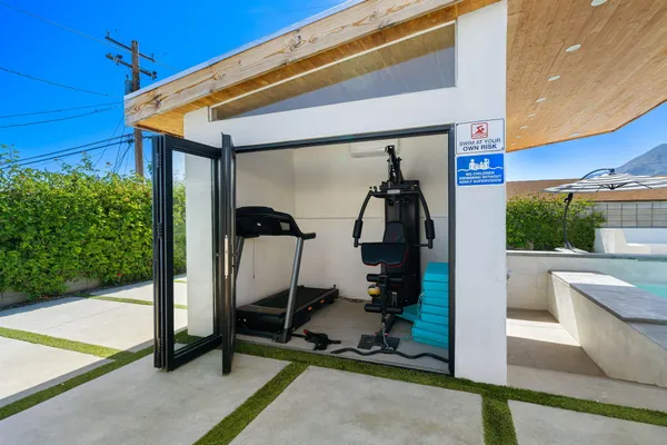 a view of a room with gym equipment