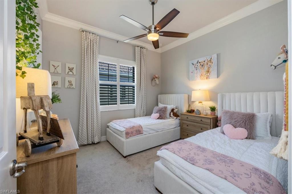 13422 Silktail Drive Naples, FL 34109 - Photo 20 of 37 Carpeted bedroom with a ceiling fan and crown molding