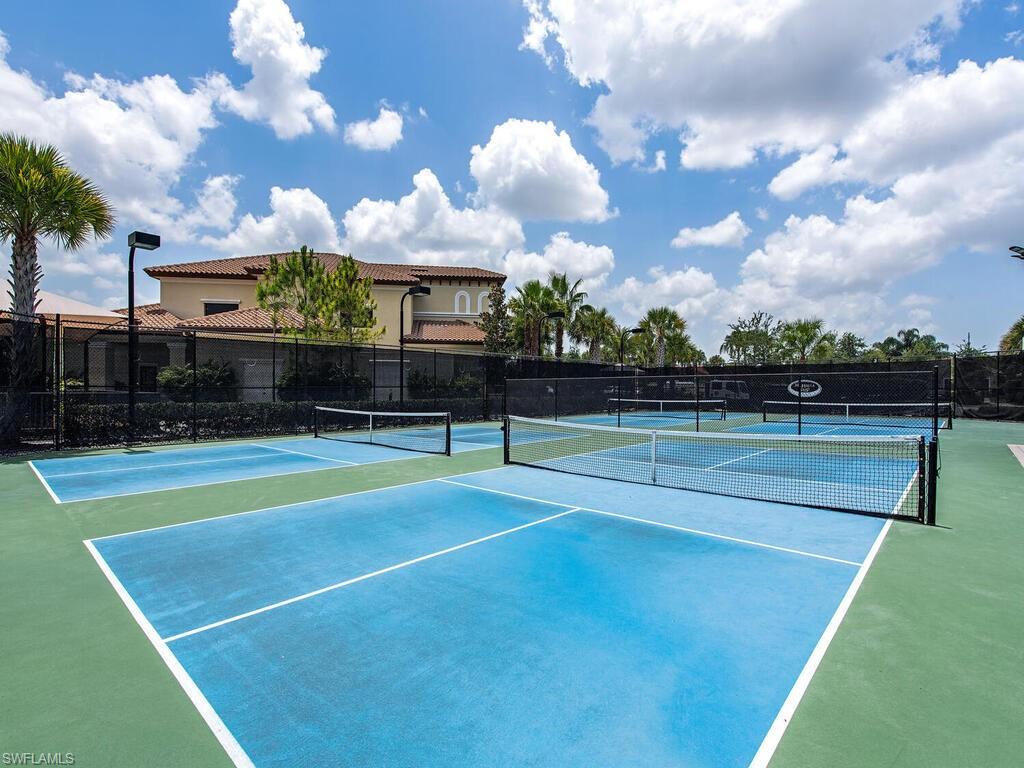 13422 Silktail Drive Naples, FL 34109 - Photo 32 of 37 View of sport court with fence