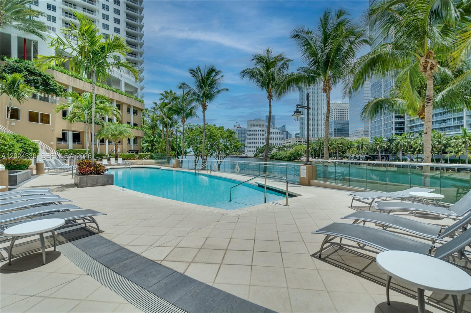 901 Brickell Key Boulevard, Unit 2006 Miami, FL 33131 - Photo 35 of 41 Heated Pool - BBQ Area - Overlooking Miami River and Board Walk