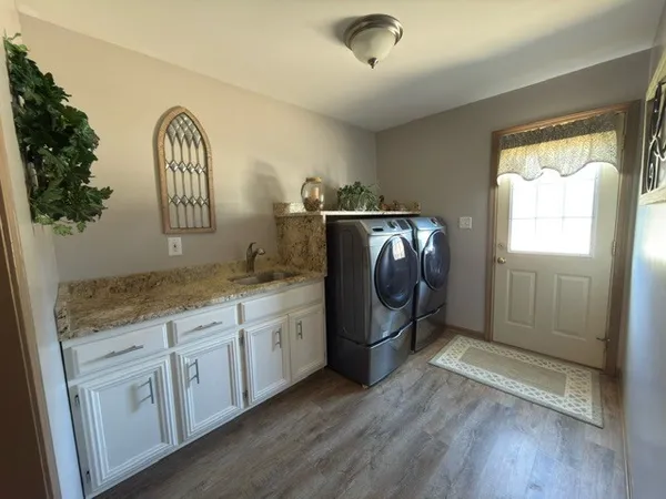 a view of living room washer and dryer
