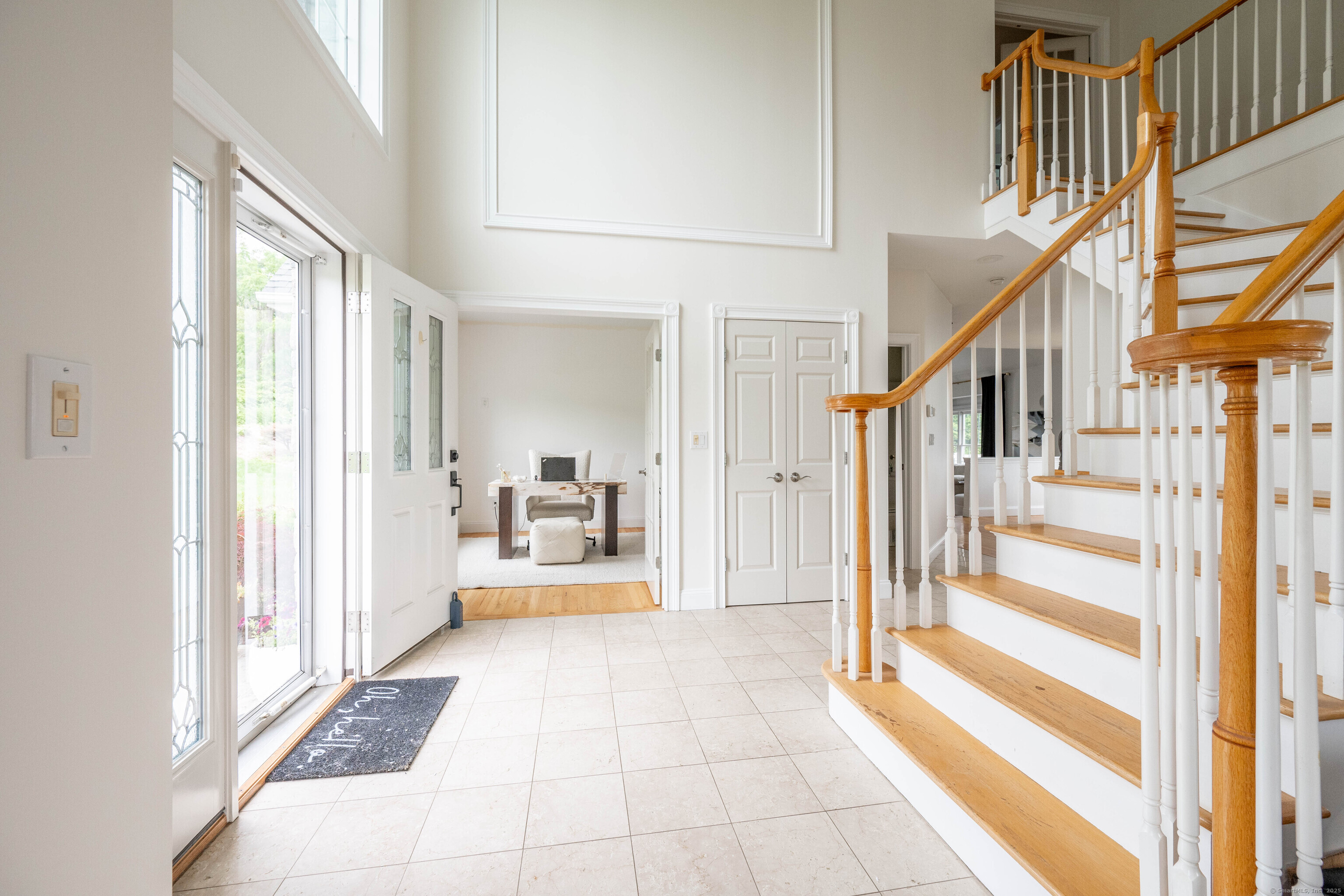 557 Upper Grassy Hill Road Woodbury, CT 06798 - Photo 5 of 40 a view of an entryway with staircase