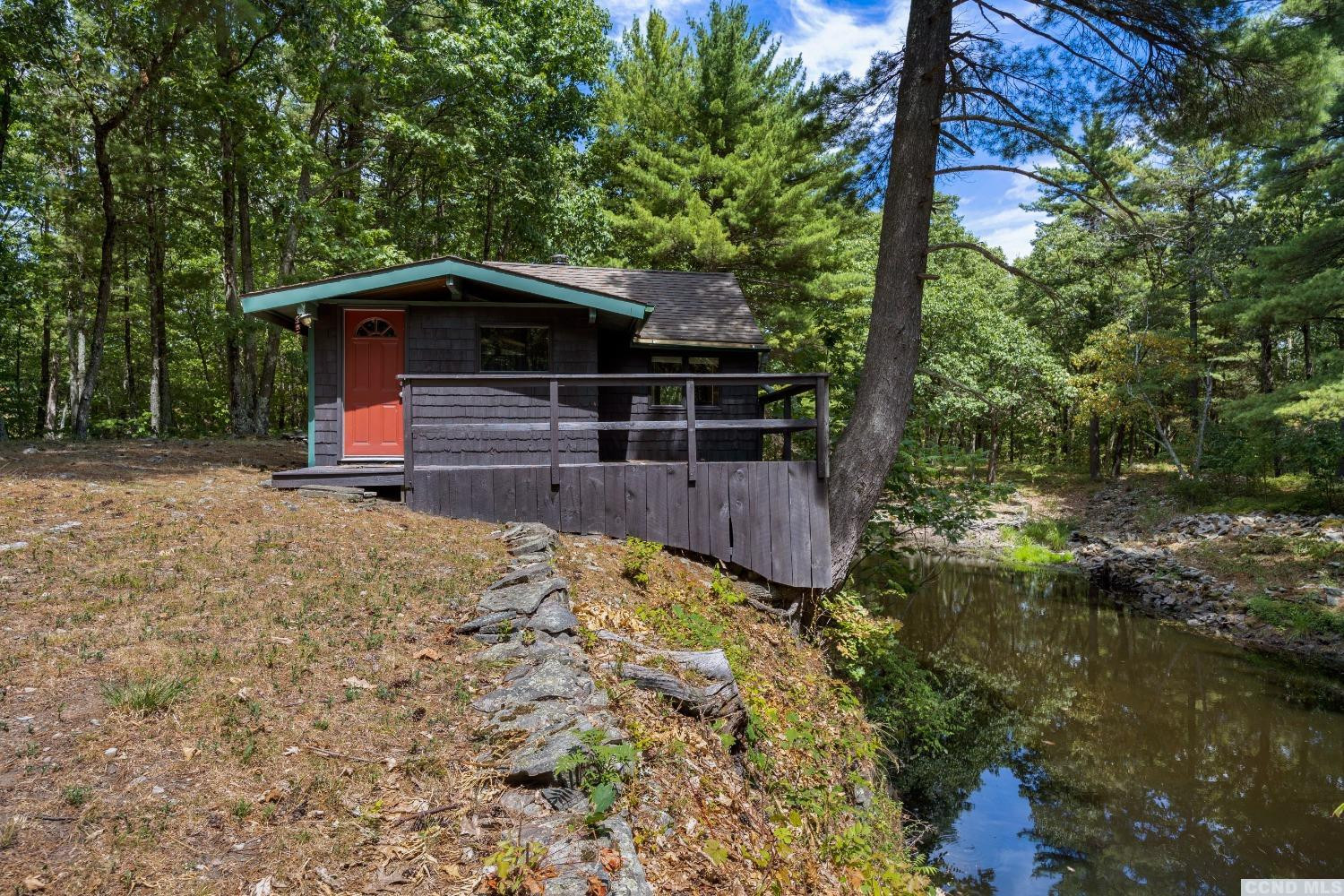75 Sullivan Mt Road Catskill, NY 12414 - Photo 3 of 27 a front view of a house with a yard