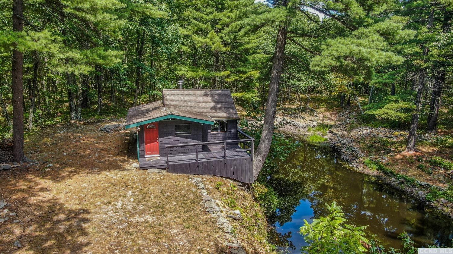 75 Sullivan Mt Road Catskill, NY 12414 - Photo 4 of 27 a view of a wooden deck with a bench
