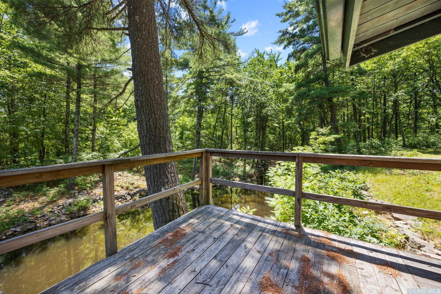 75 Sullivan Mt Road Catskill, NY 12414 - Photo 7 of 27 a view of a balcony with wooden floor