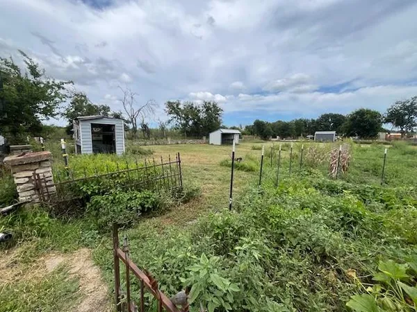 a view of a lake with a big yard