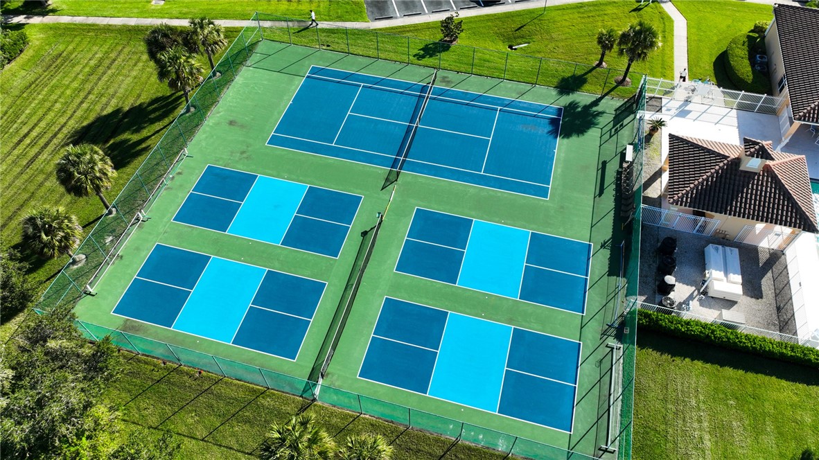 535 Valencia Circle Southwest Vero Beach, FL 32968 - Photo 35 of 36 a view of front door and a yard