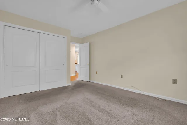 a view of an empty room and entryway