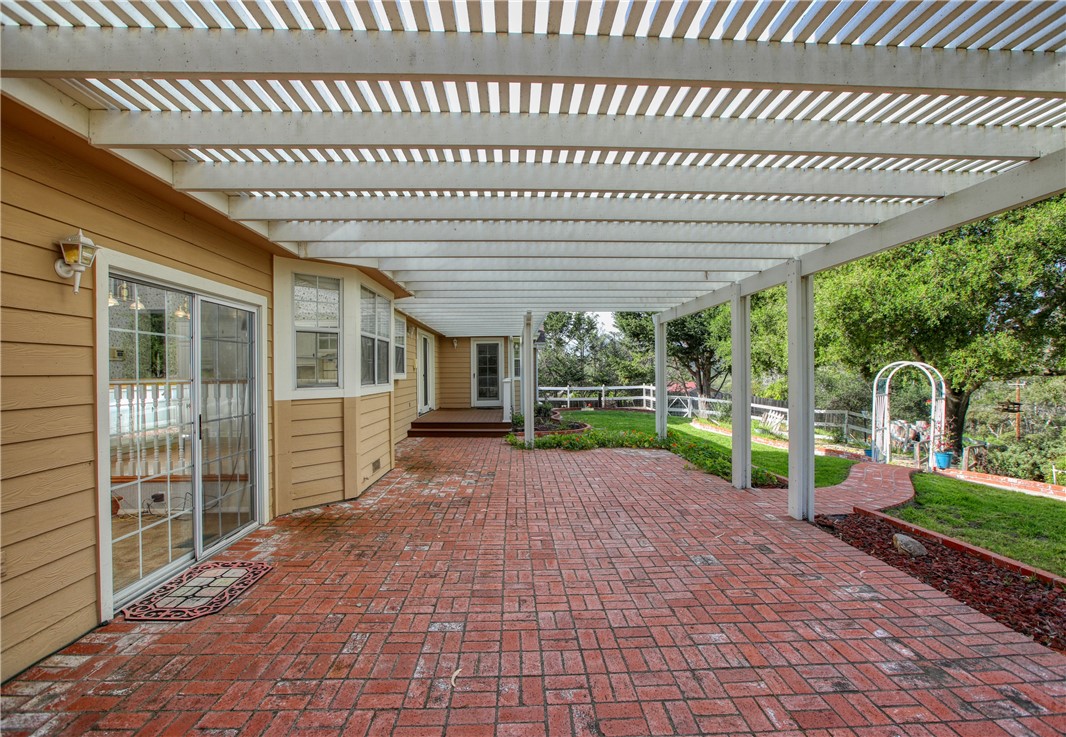 350 Corbett Canyon Road Arroyo Grande, CA 93420 - Photo 11 of 66 a view of a house with backyard and sitting area