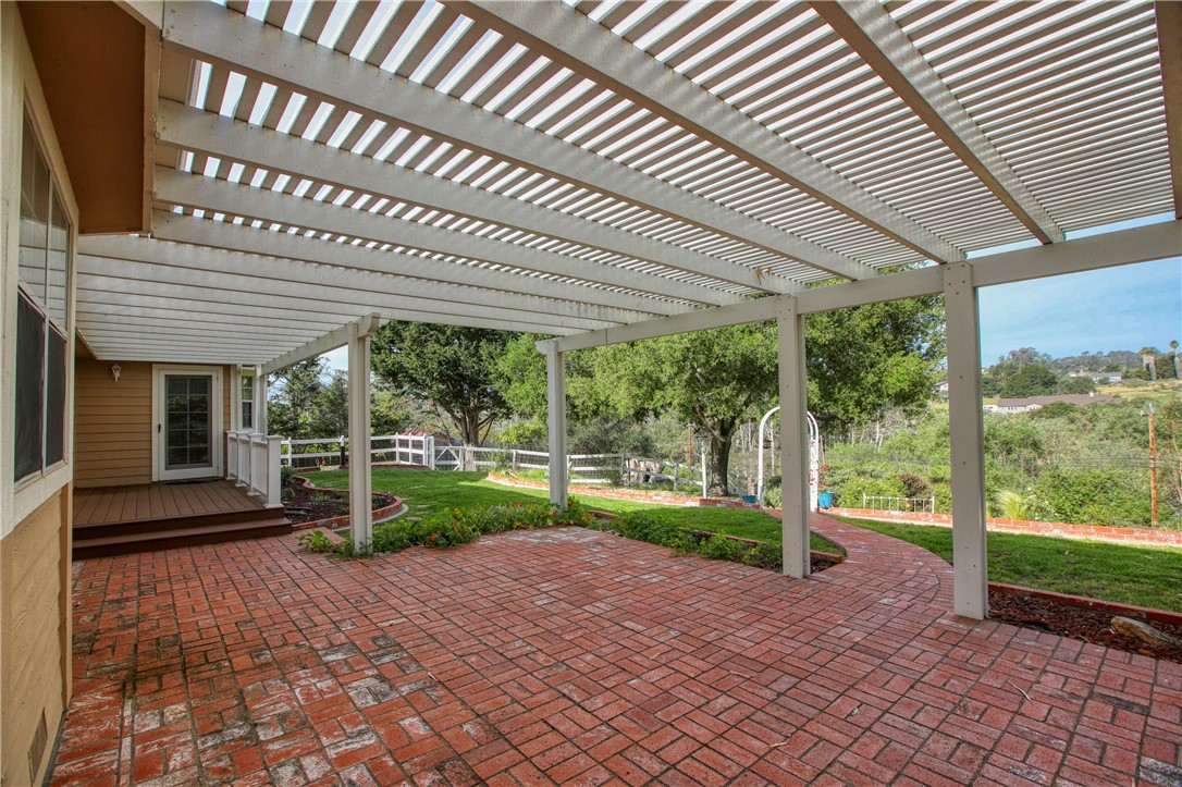 350 Corbett Canyon Road Arroyo Grande, CA 93420 - Photo 12 of 66 a view of a house with backyard and porch