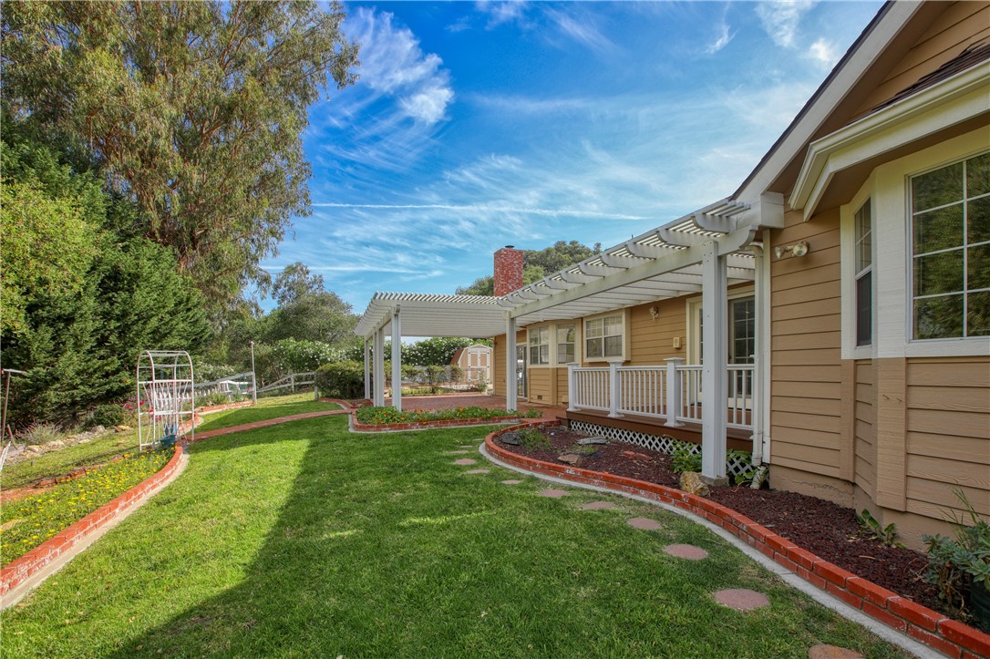 350 Corbett Canyon Road Arroyo Grande, CA 93420 - Photo 14 of 66 a view of a house with a yard