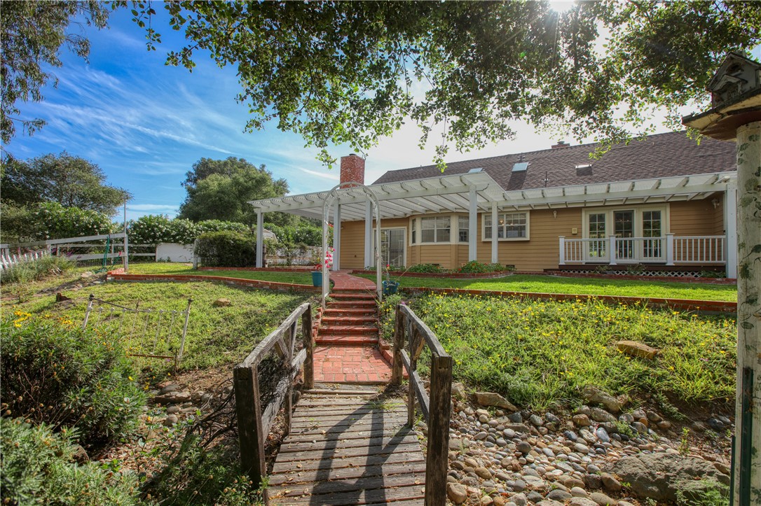 350 Corbett Canyon Road Arroyo Grande, CA 93420 - Photo 17 of 66 a view of a house with a yard