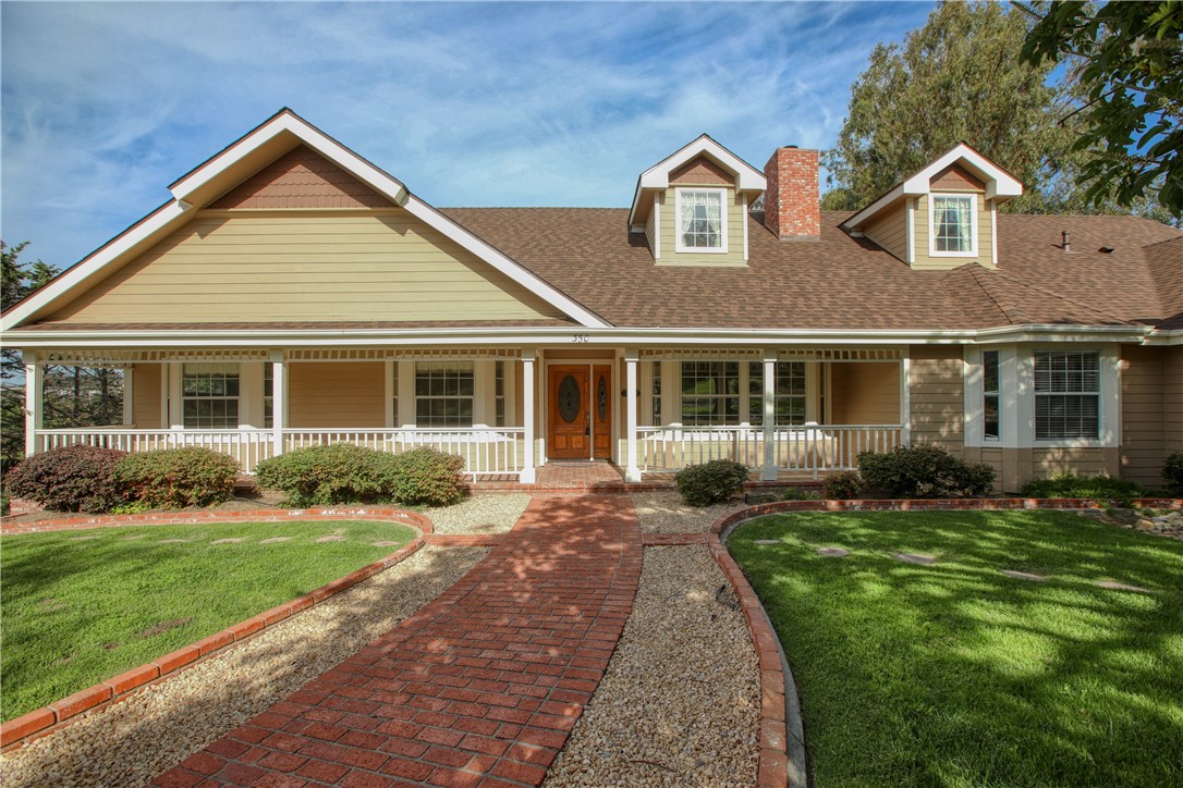 350 Corbett Canyon Road Arroyo Grande, CA 93420 - Photo 2 of 66 a front view of a house with a yard