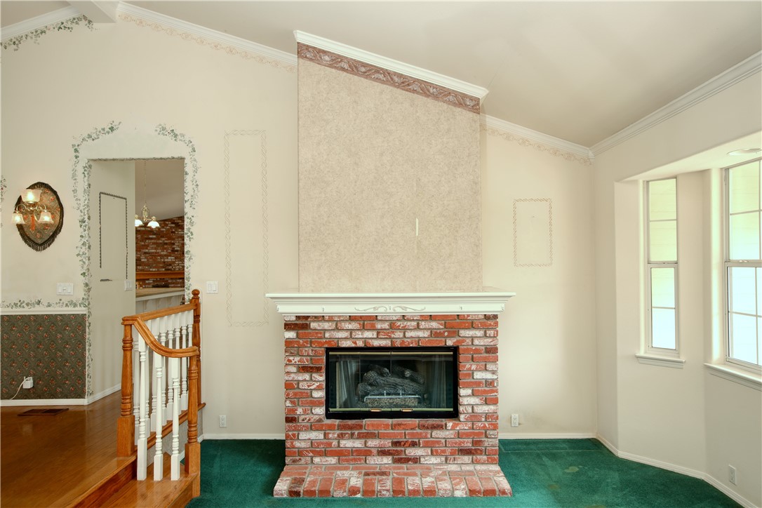 350 Corbett Canyon Road Arroyo Grande, CA 93420 - Photo 23 of 66 a living room with furniture and a fireplace