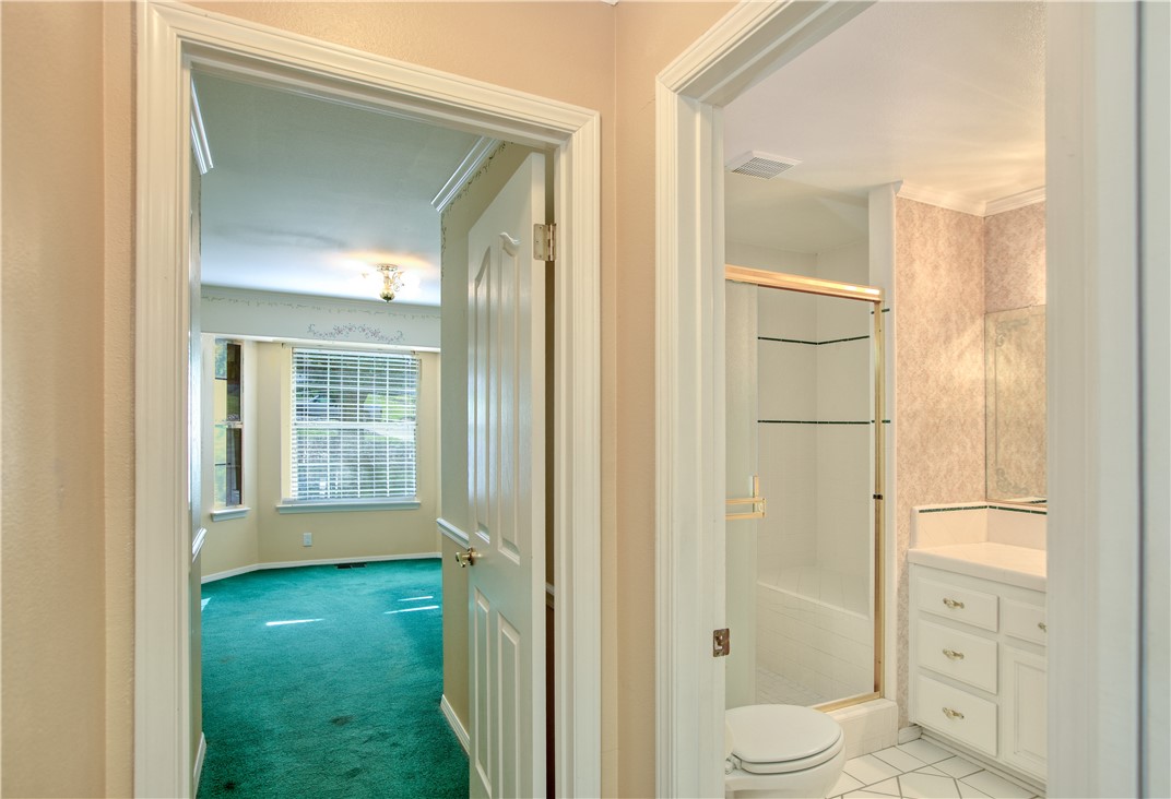 350 Corbett Canyon Road Arroyo Grande, CA 93420 - Photo 34 of 66 a bathroom with a toilet a sink and shower