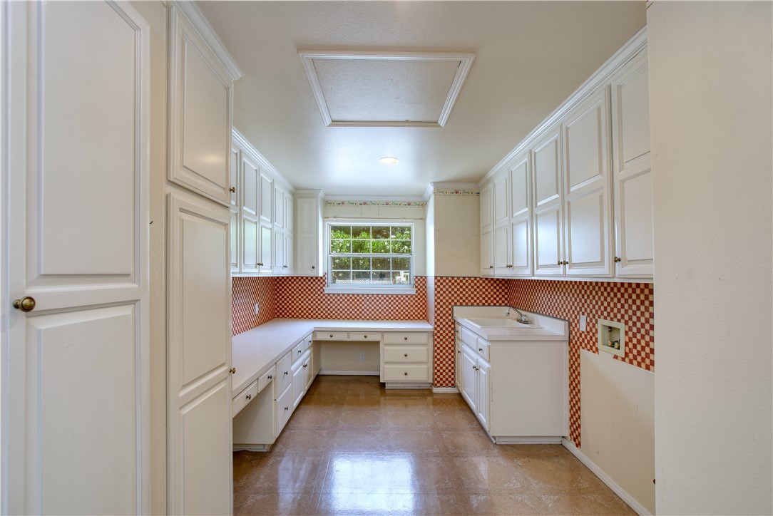 350 Corbett Canyon Road Arroyo Grande, CA 93420 - Photo 38 of 66 a view of a kitchen with wooden floor and electronic appliances