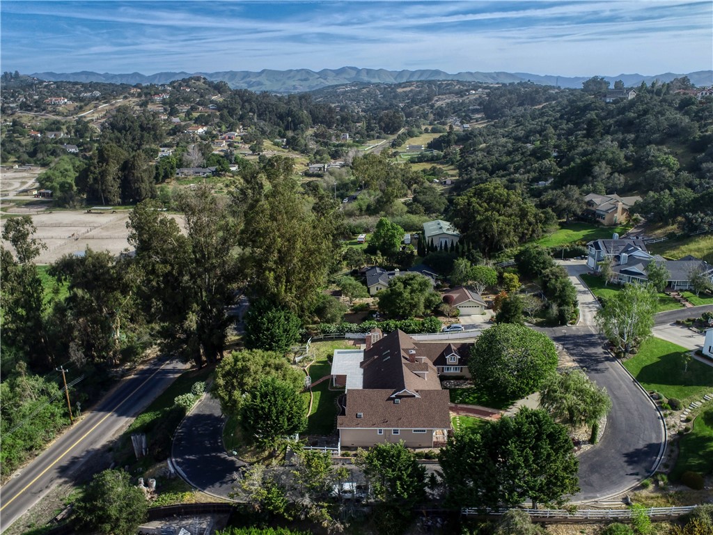 350 Corbett Canyon Road Arroyo Grande, CA 93420 - Photo 62 of 66 an aerial view of a house with a yard and lake view