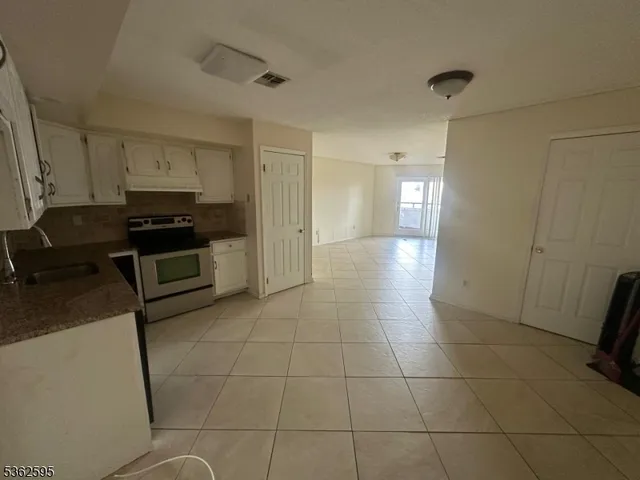 a bathroom with a sink and a washing machine
