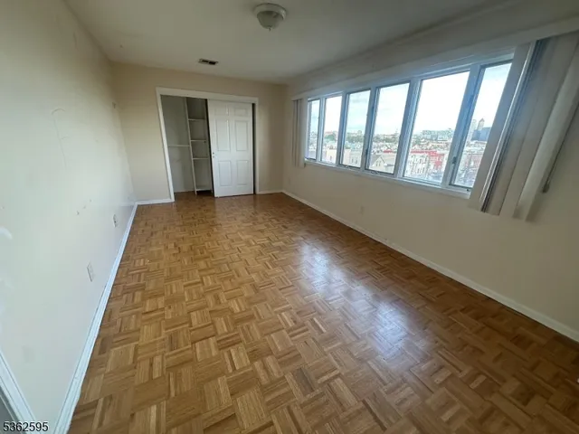 a view of hallway with windows
