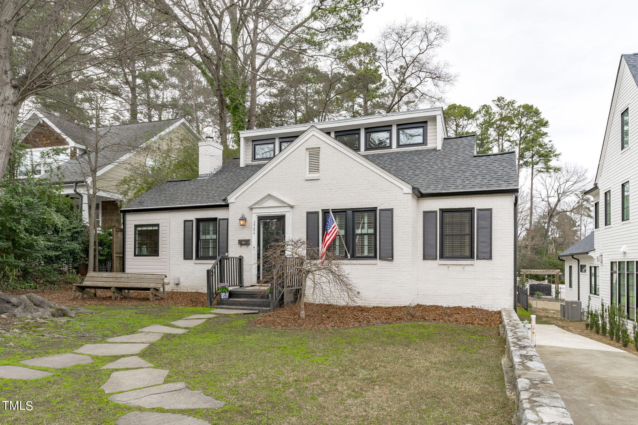 2704 Barmettler Street Raleigh, NC 27607 - Photo 1 of 32 a front view of house with yard