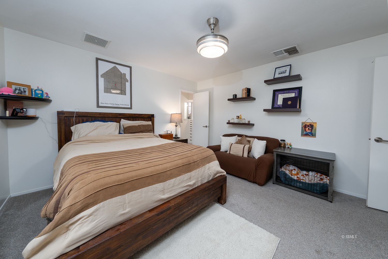 218 Washington Way Ridgecrest, CA 93555 - Photo 15 of 34 a bedroom with bed and a chandelier
