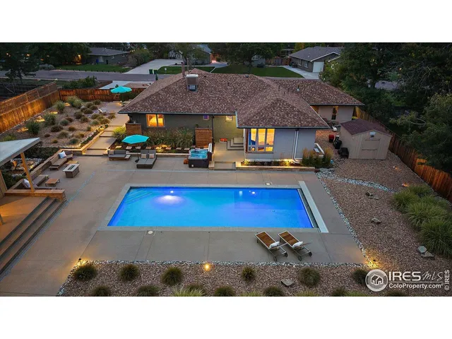 a outdoor space with swimming pool and furniture