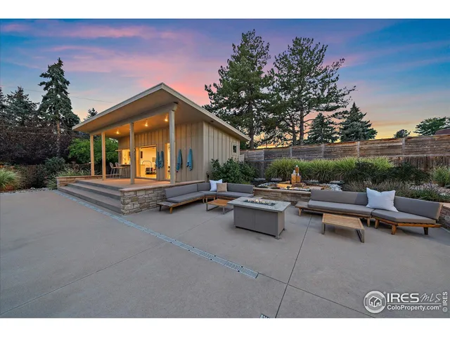a view of a terrace with sitting area