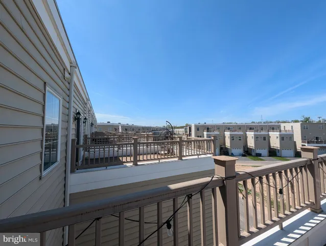 a view of a balcony with city view