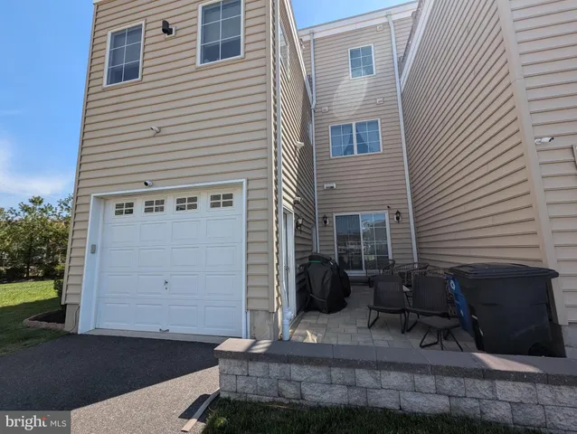 a view of house with chair and tables