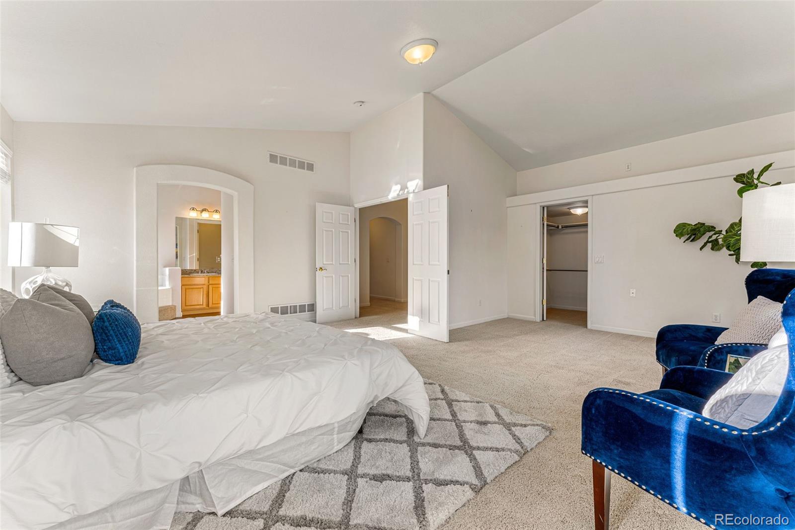 276 East Fair Lane Centennial, CO 80121 - Photo 22 of 38 a bedroom with a bed and window