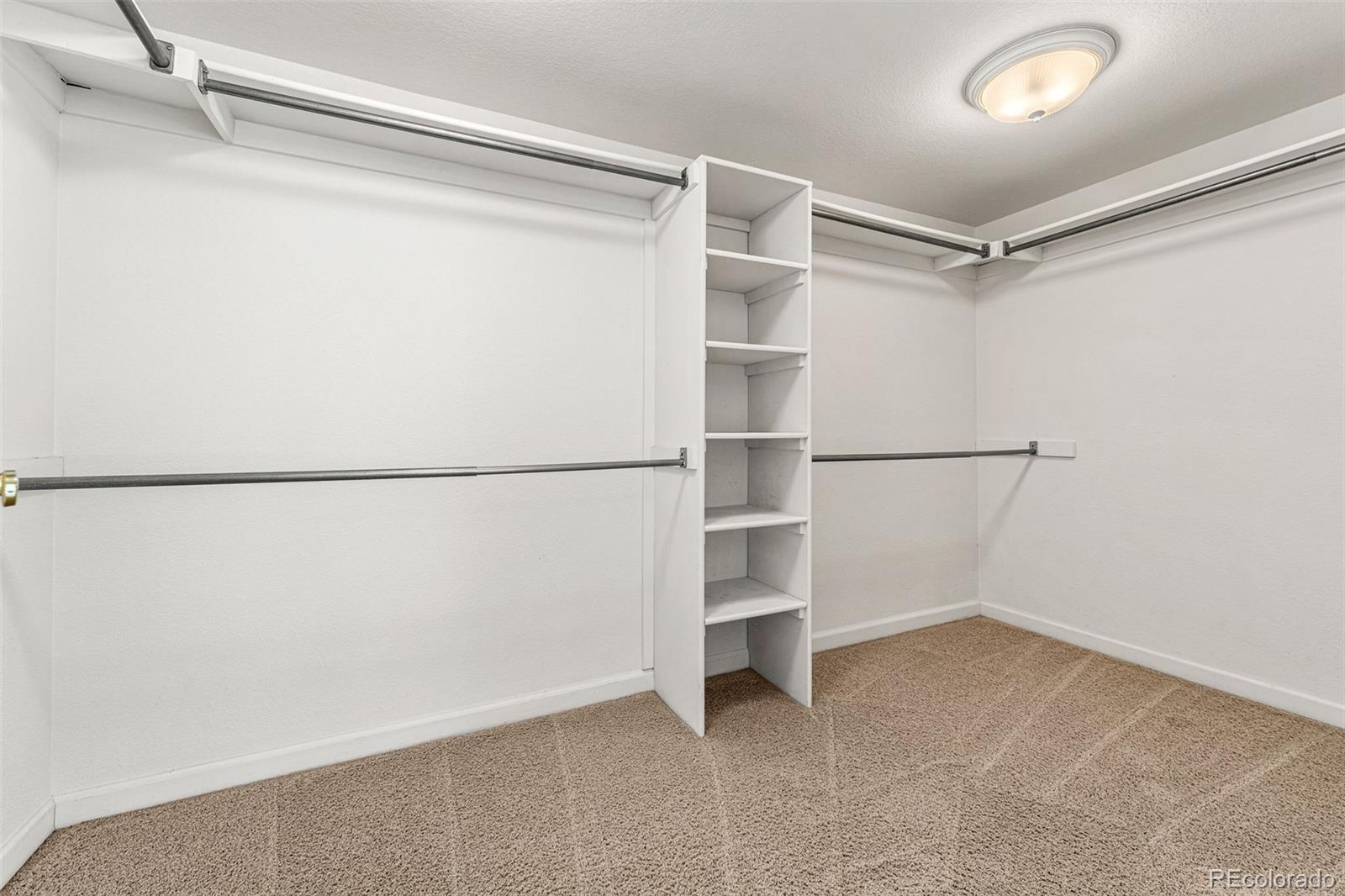 276 East Fair Lane Centennial, CO 80121 - Photo 25 of 38 a view of an empty walk in closet