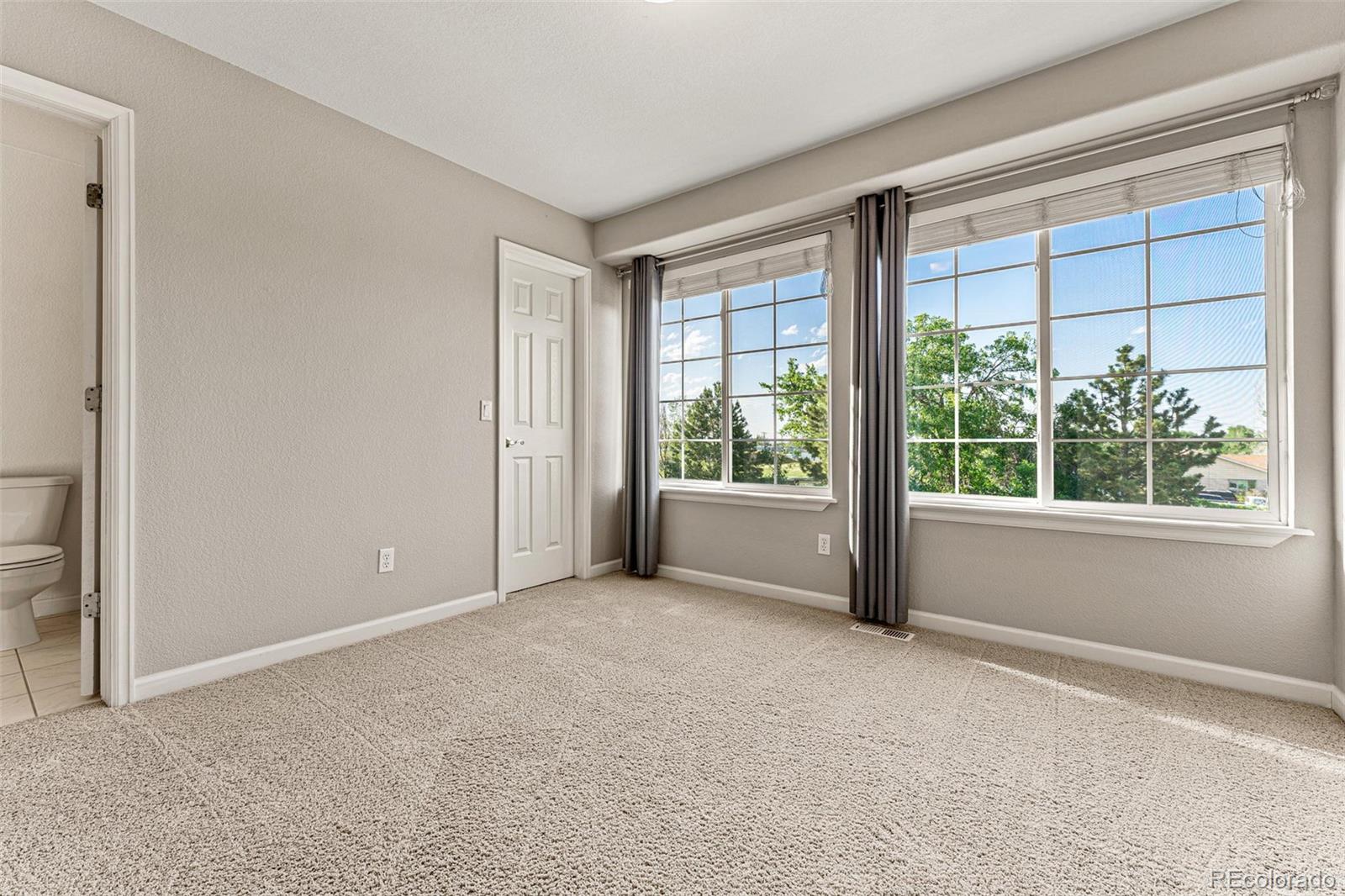 276 East Fair Lane Centennial, CO 80121 - Photo 29 of 38 a view of an empty room with a window