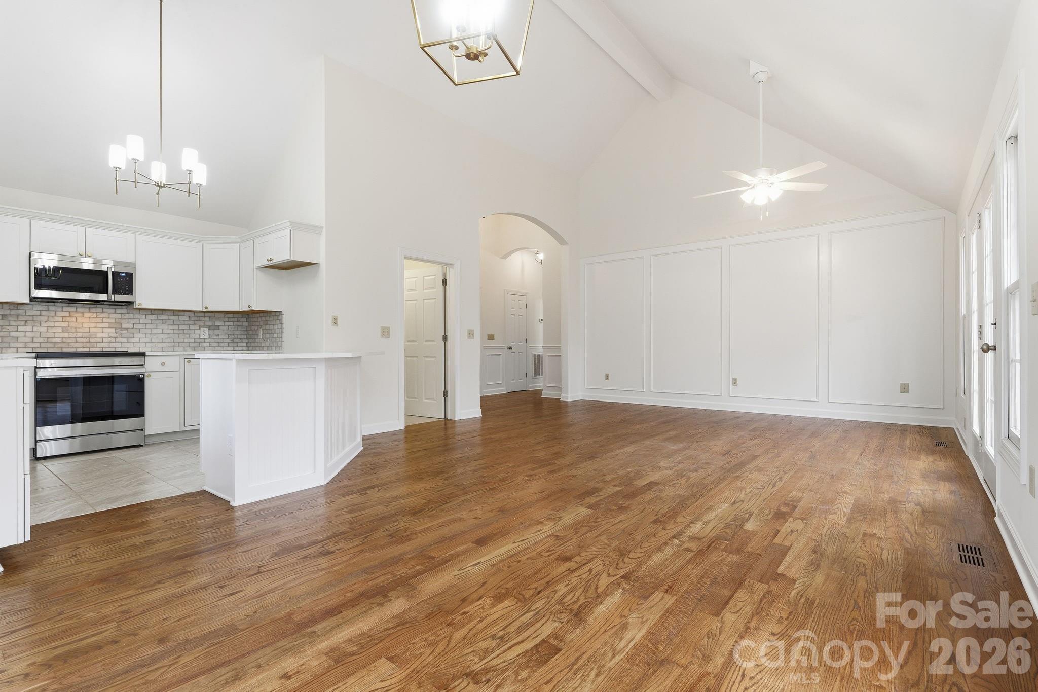 157 Byers Road Troutman, NC 28166 - Photo 11 of 32 a view of a kitchen with microwave and stove