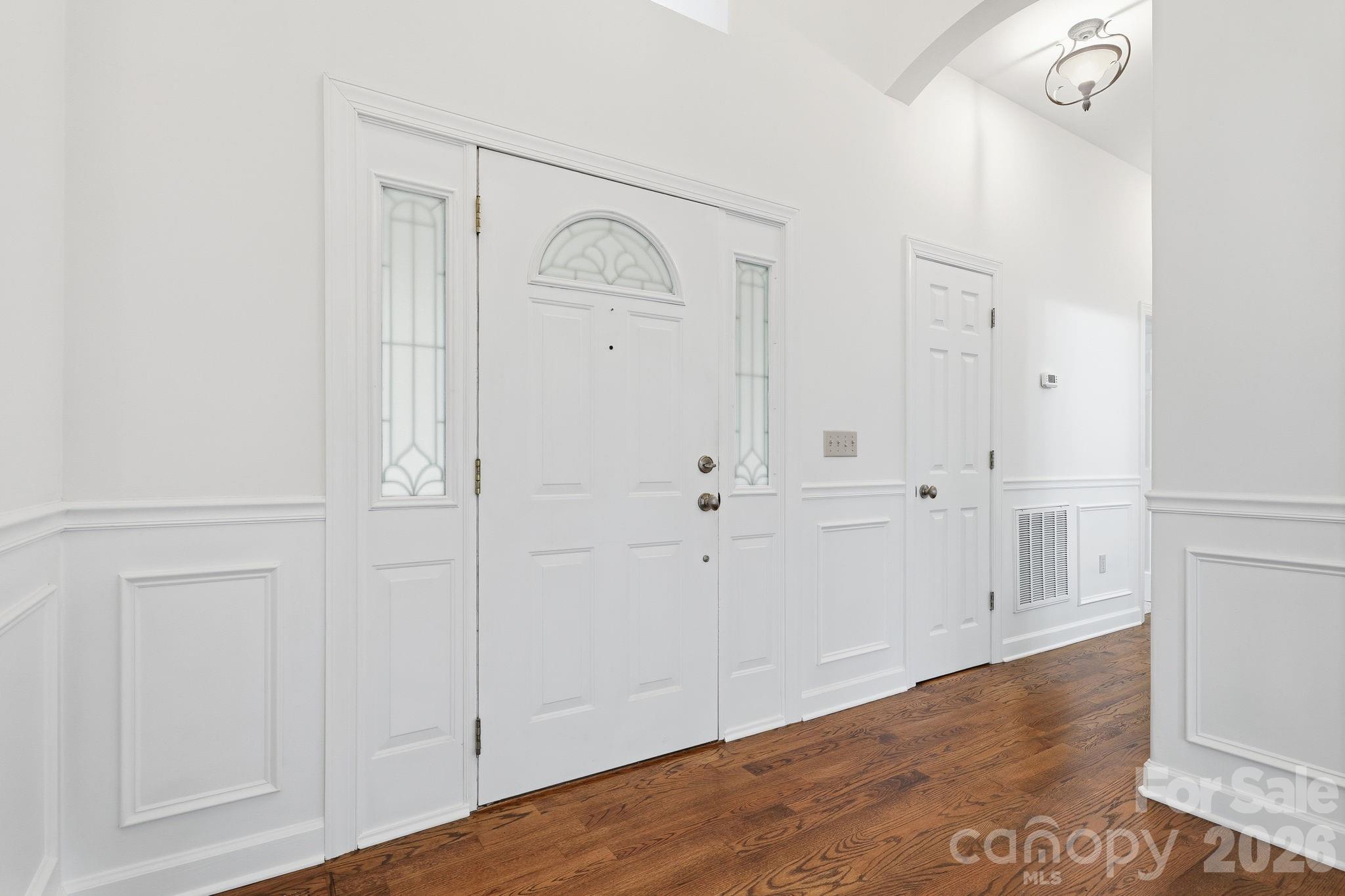 157 Byers Road Troutman, NC 28166 - Photo 4 of 32 wooden floor with white walls