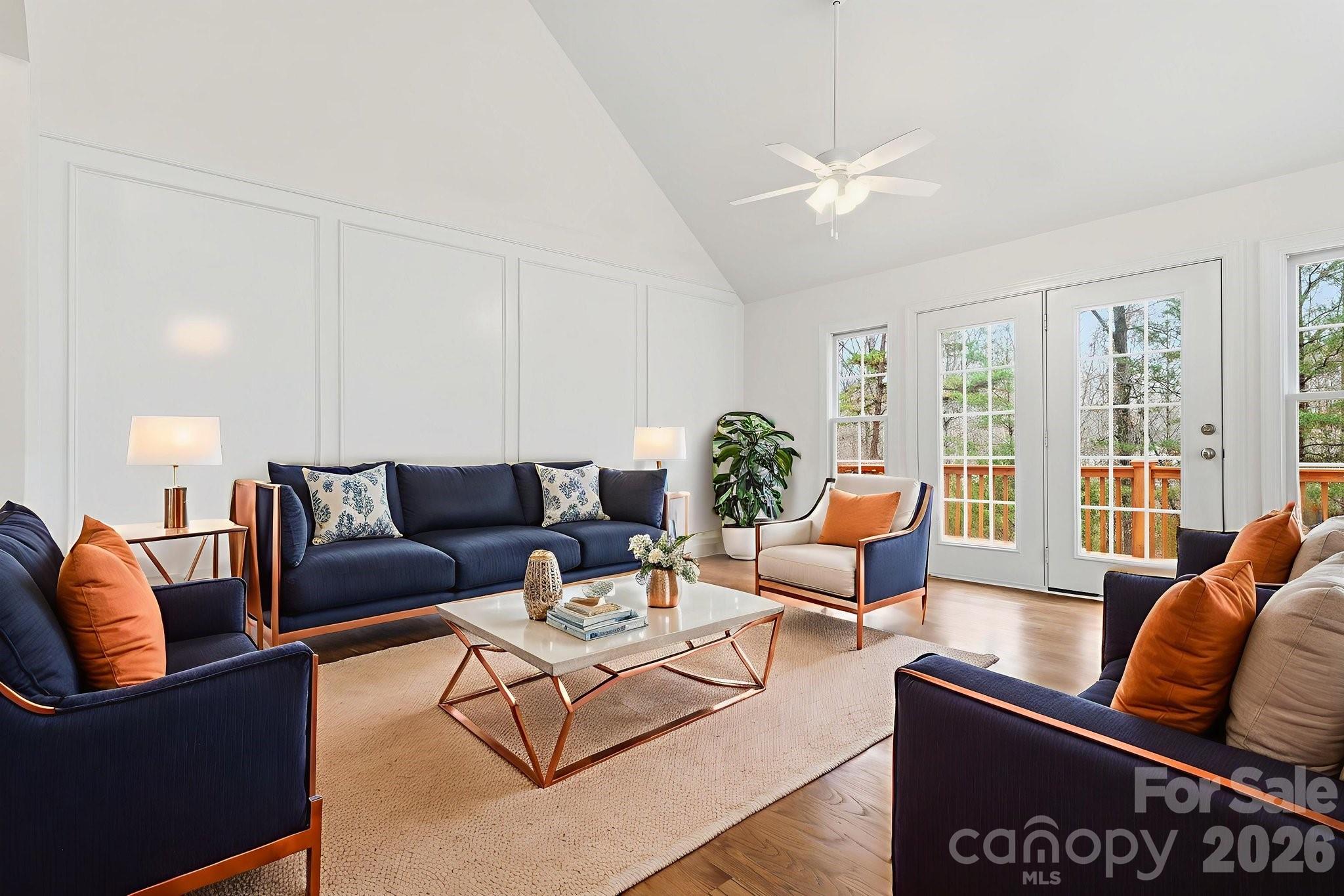 157 Byers Road Troutman, NC 28166 - Photo 6 of 32 a living room with furniture and a large window