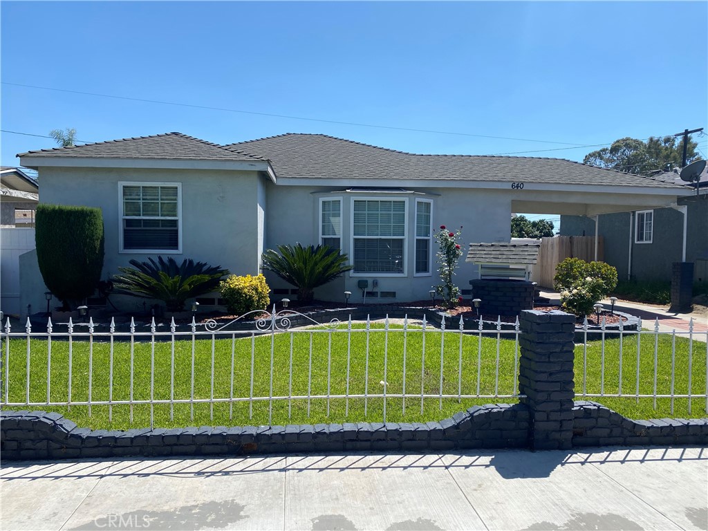 640 East Harding Street Long Beach, CA 90805 - Photo 1 of 3 a view of a house with a chairs in a patio