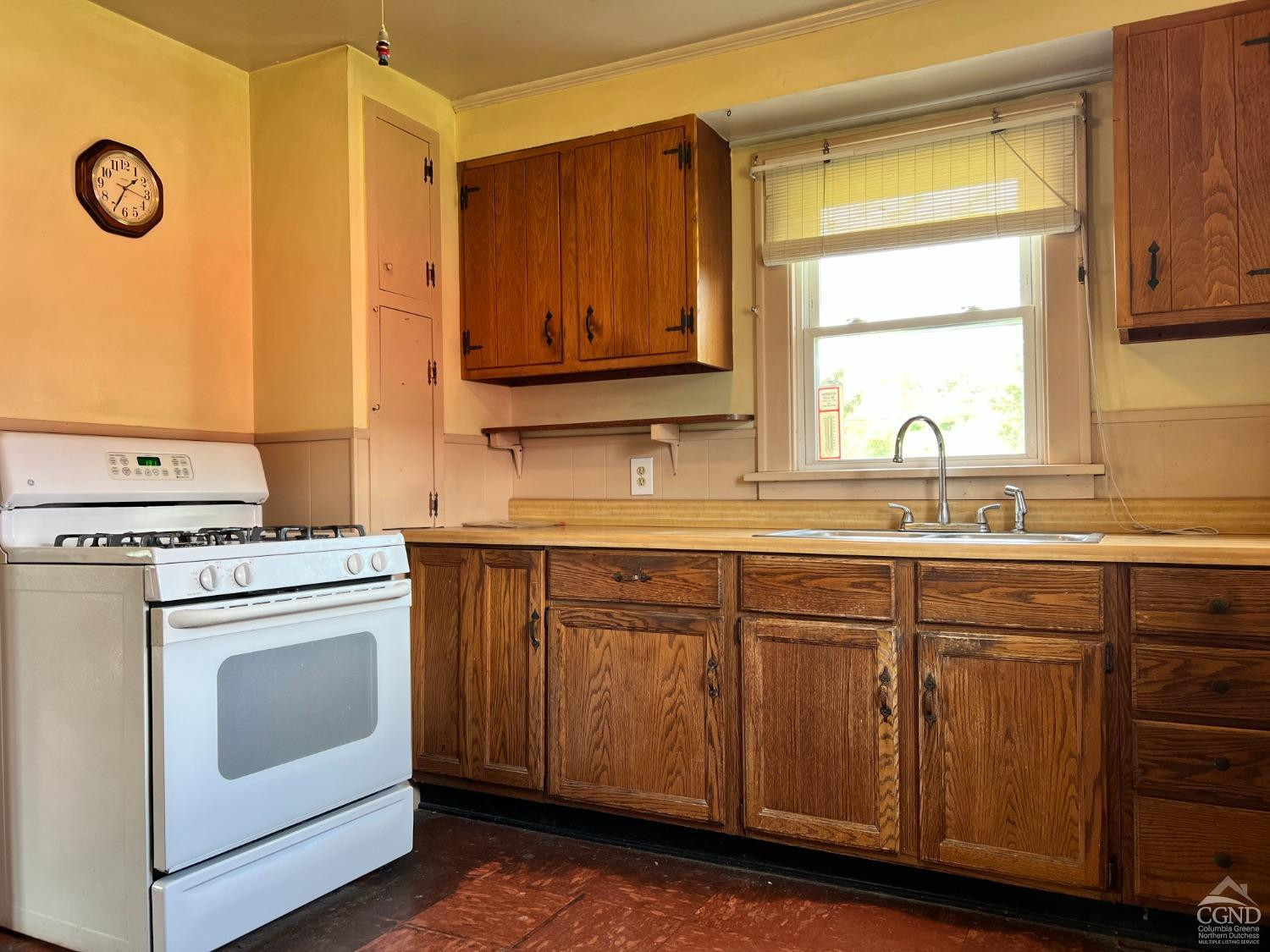 1781 Highway 23 Copake, NY 12521 - Photo 16 of 24 a kitchen with cabinets appliances a sink and a window