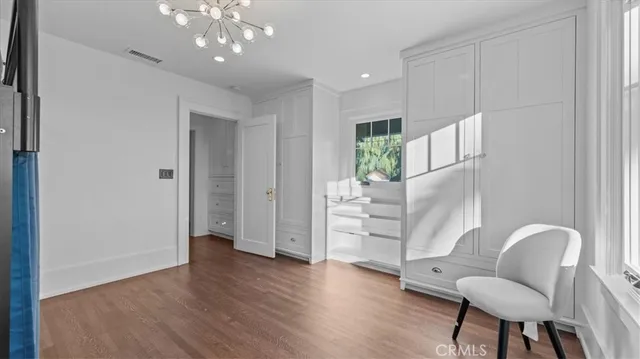 a view of livingroom with furniture and wooden floor