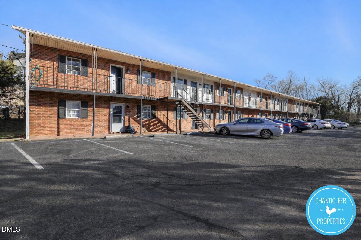 115 Florence Street, Unit 13 Graham, NC 27253 - Photo 28 of 29 a front view of a house with a yard