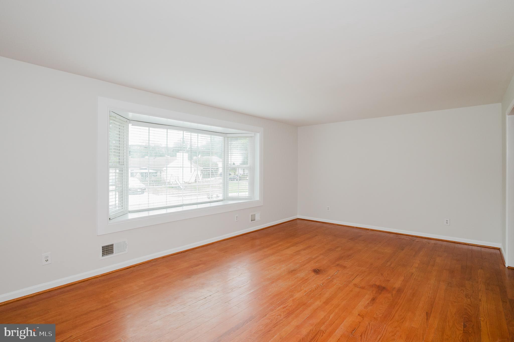 4 Old Spring Court Cockeysville, MD 21030 - Photo 6 of 53 an empty room with a window