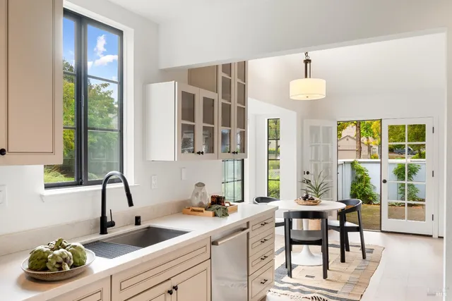 a kitchen with a sink and a window