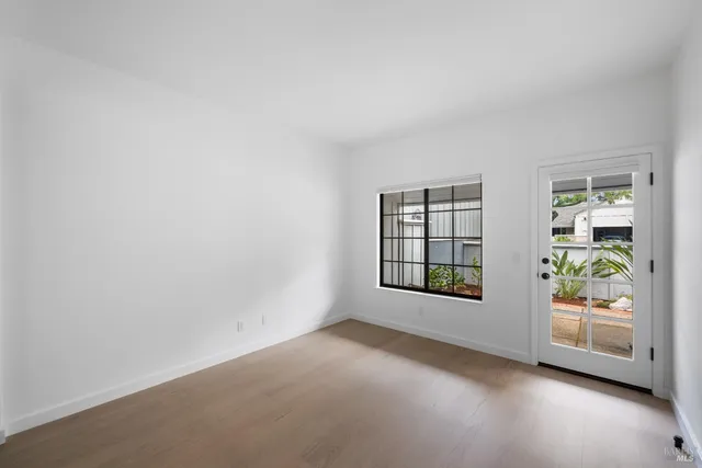 an empty room with windows