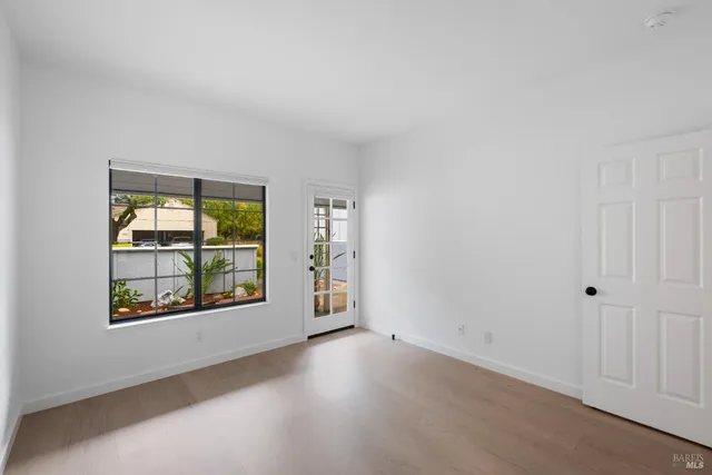 an empty room with windows