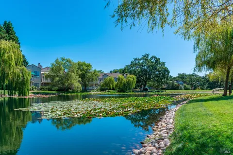 a view of a lake with a big yard