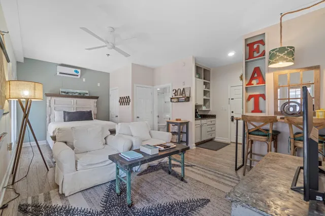 a living room with furniture and a table