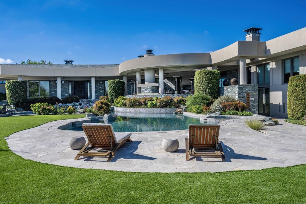 17534 Los Morros Rancho Santa Fe, CA 92067 - Photo 1 of 40 a table and chairs in front of house and outdoor seating