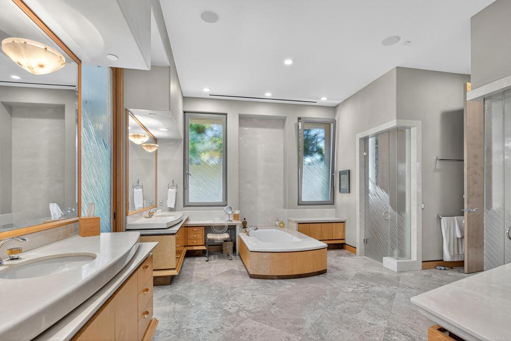 17534 Los Morros Rancho Santa Fe, CA 92067 - Photo 12 of 40 a living room with furniture and a large window