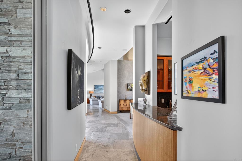 17534 Los Morros Rancho Santa Fe, CA 92067 - Photo 33 of 40 a living room with furniture and a flat screen tv