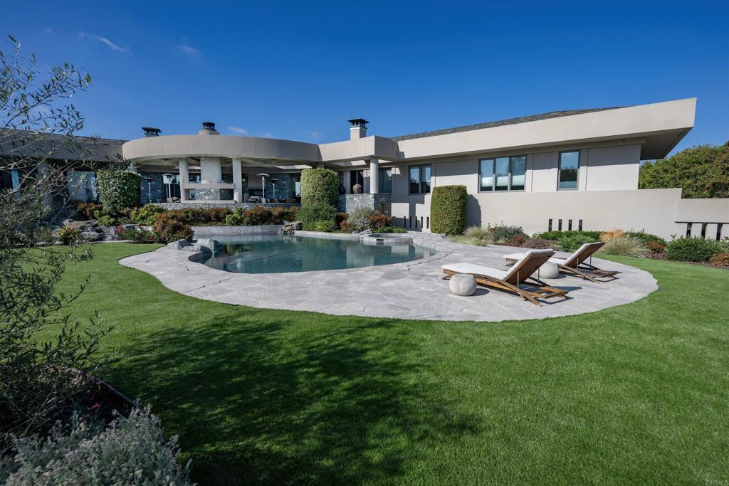 17534 Los Morros Rancho Santa Fe, CA 92067 - Photo 39 of 40 a front view of house with a garden and patio