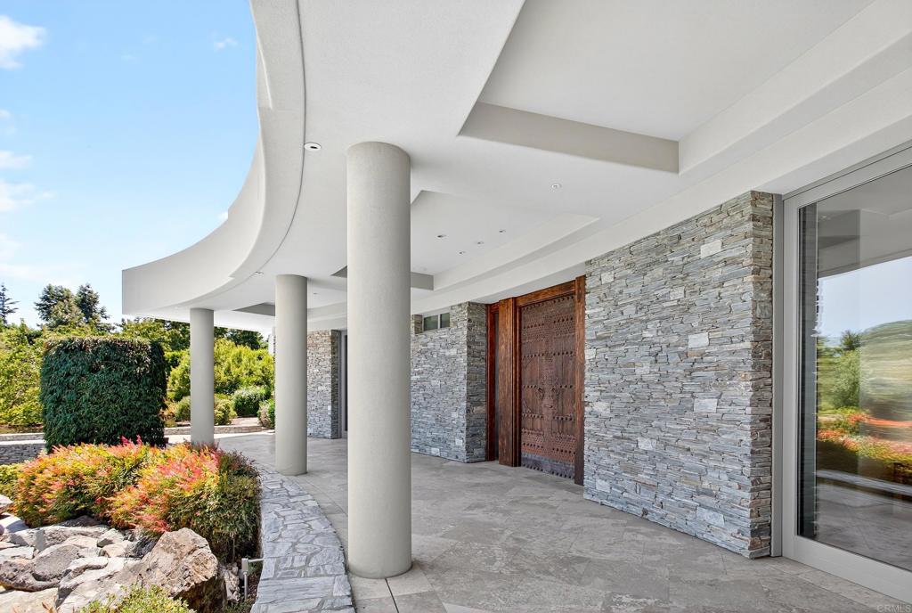 17534 Los Morros Rancho Santa Fe, CA 92067 - Photo 5 of 40 a outdoor space with furniture